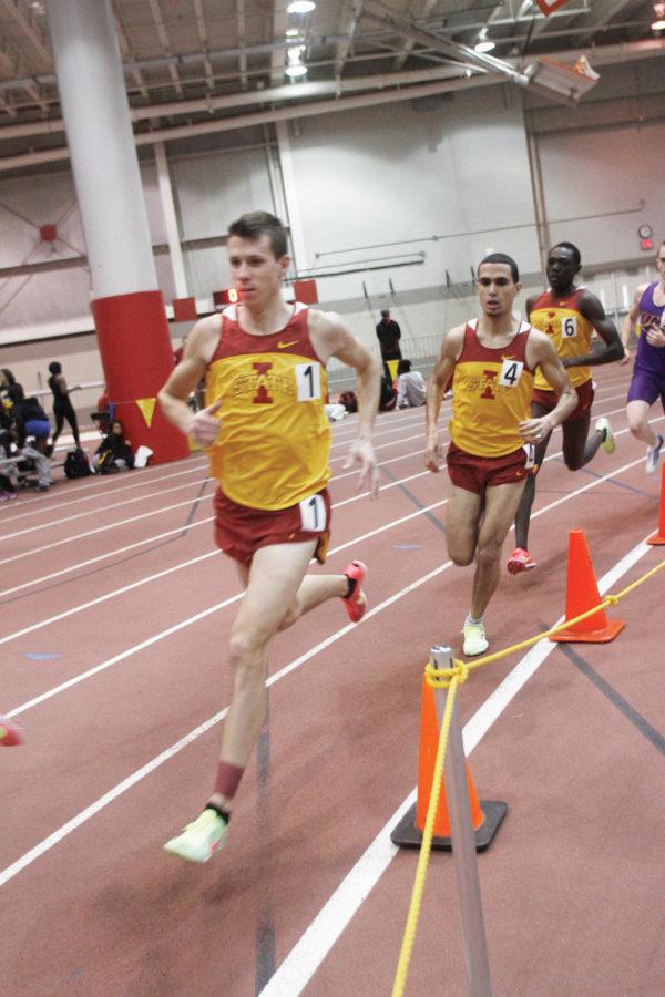 Rico Loy comes around the bend in first in the mens mile with teammates Mohamed Hrezi and Abdou Seye right behind during the NCAA Qualifier track meet at Lied Recreation Athletic Center on Saturday, March 3. Loy placed first with a time of 4:03.35.

