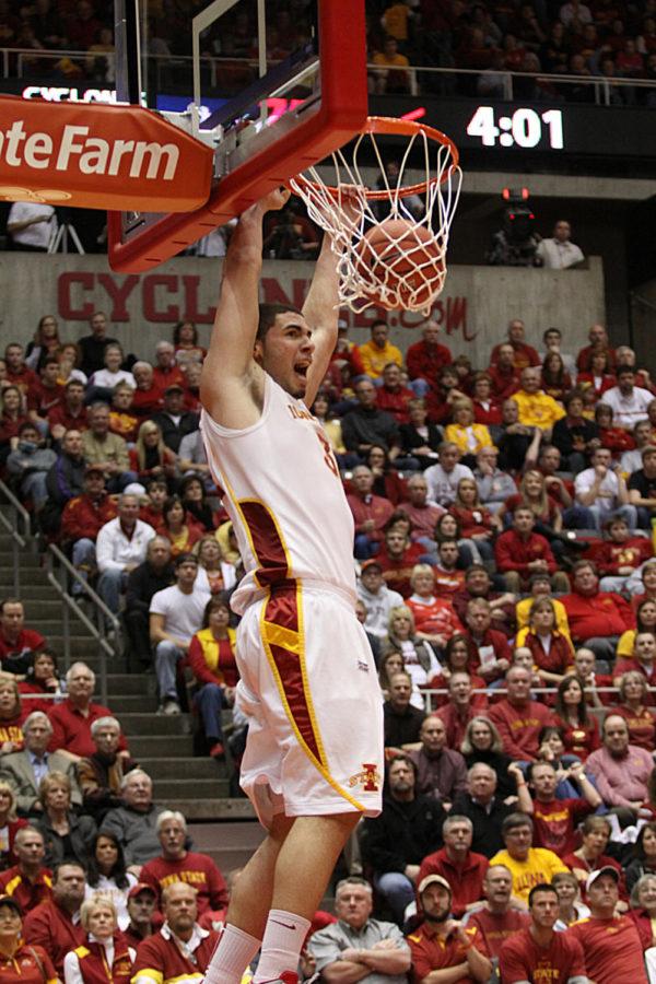 ISU forward Georges Niang dunks the ball after getting a head start with the rebound. Niang was a high scorer of the game, allowing the Cyclones to take home a win against the Longhorns with a score of 82-62.
