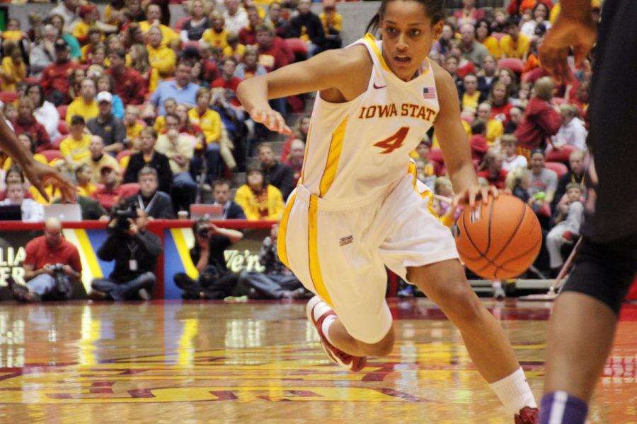 Sophomore guard Nikki Moody drives inside the 3-point line against TCU on Jan. 12, 2013, at Hilton Coliseum.  Moody reached nine assists for the fifth time this season in the 68-52 victory.
