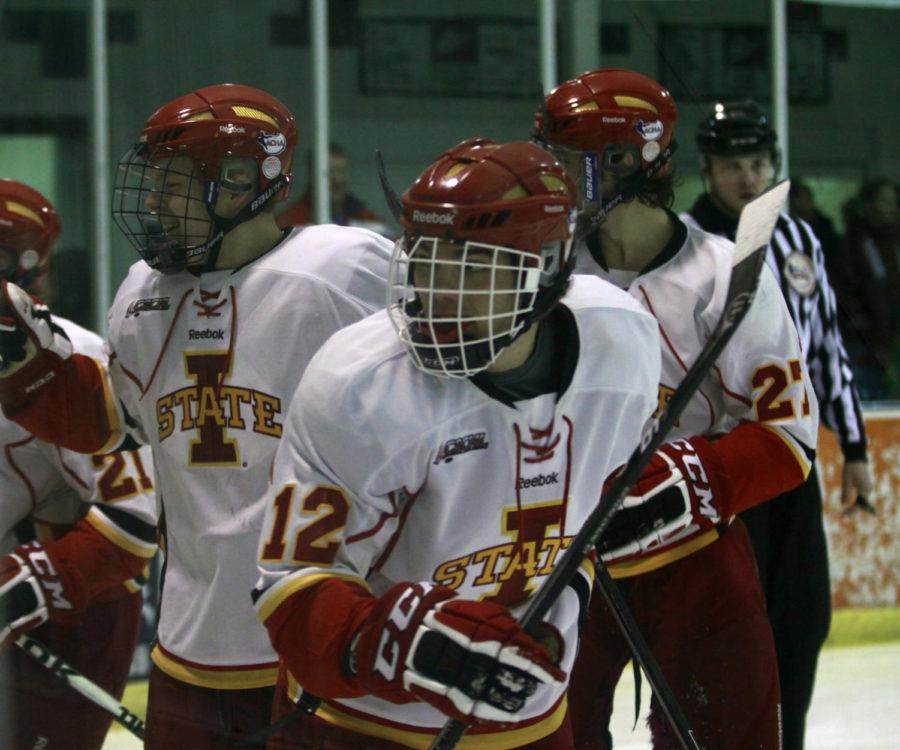 Members of the ISU Hockey team celebrate after scoring a goal against the Lindenwood Lions on Feb. 8 at the Ames/ISU Ice Arena. The Cyclones won the game 5-4.
