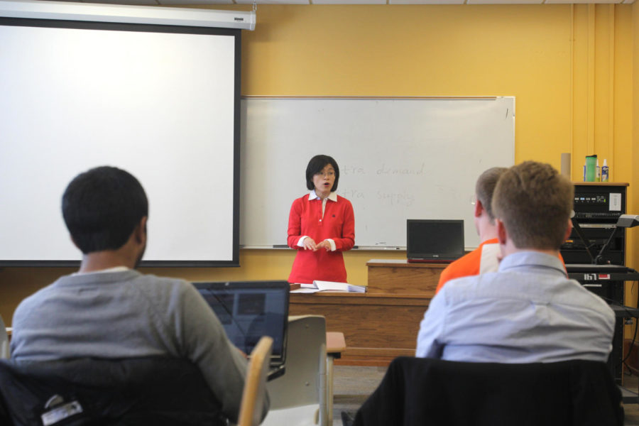 Adjunct Assistant Professor Hongli Feng teaches her class the economies of China on Feb. 26 at Curtiss Hall
