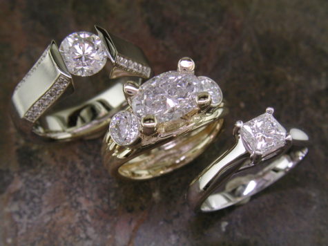 Typical wedding ring metal types are 14K white, top left, 14K yellow, and platinum. The newer 14K white gold and platinum are indiscernible to naked eye. Courtesy photo: Kyle Youngberg, Ames Silversmithing