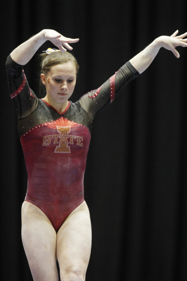 Michelle Shealy prepares a flip on the beam during the Cyclones
opening meet against Nebraska on Friday, Jan. 20, at Hilton
Coliseum. Shealy scored a 9.675 and finished the night with an
all-around score of 38.925.
