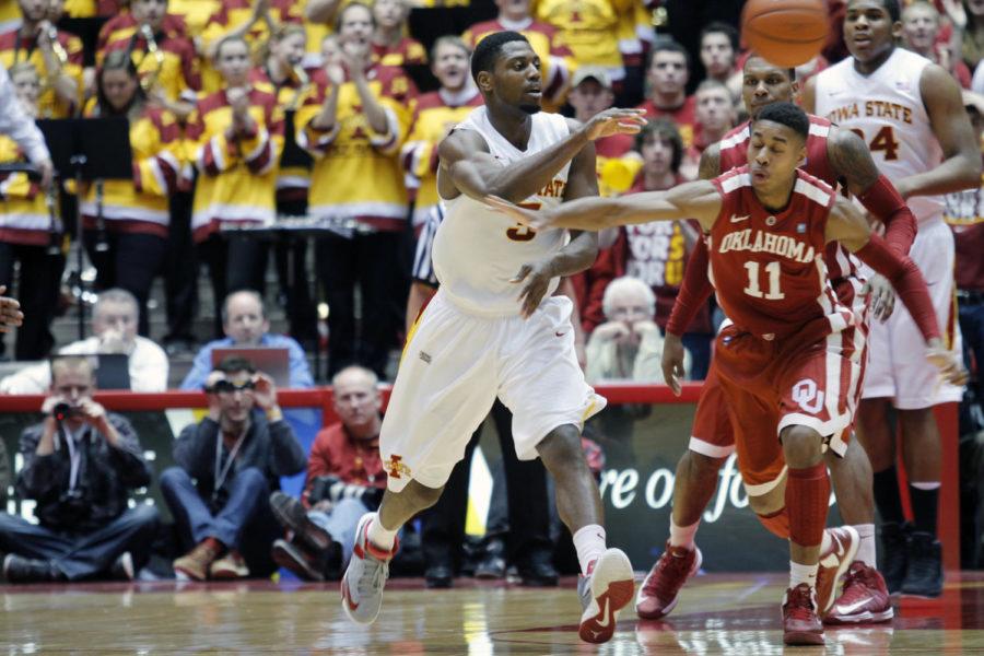 Iowa States Melvin Ejim swings the ball around the perimeter in the first half against the Oklahoma Sooners on Feb. 4 at Hilton Coliseum. The Cyclones defeated the Sooners 83-64. Ejim finished the game with 12 points and seven rebounds. The win was Iowa States 20th straight win at home.
