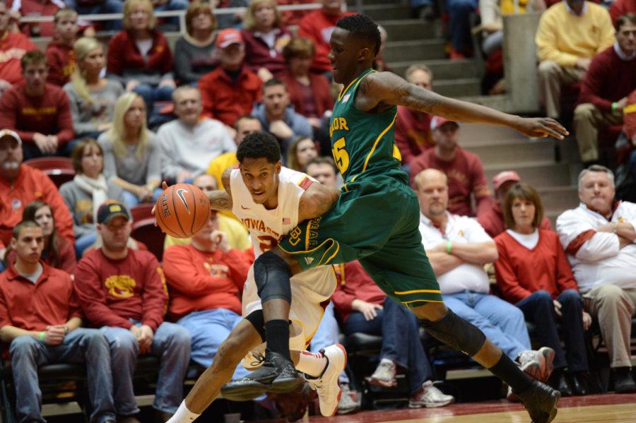 Will Clyburn attempts to pass a player from Baylor in the win 79-71 on Saturday, Feb. 2, at Hilton Collisuem. Clyburn had a total of 28 points in the game.
