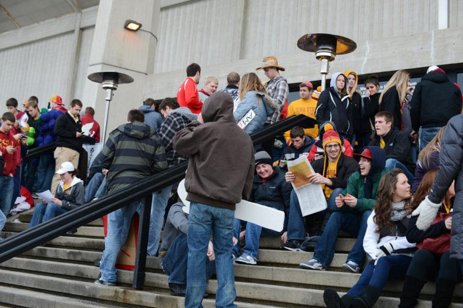 Avid fans wait outside Hilton Coliseum hours before the men's basketball game against Kansas University on Feb. 25.
