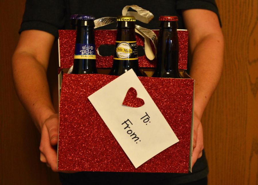 Wrap a make-your-own six-pack of beer in colorful wrapping paper for an easy and inexpensive present. 
