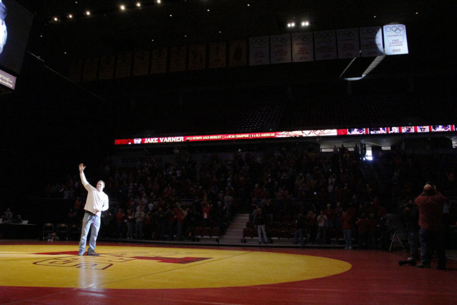 Olympic gold medalist Jake Varner is honored by the revelation of the new banner for his victory hanging from the rafters of Hilton Coliseum on Sunday, Feb. 3.
