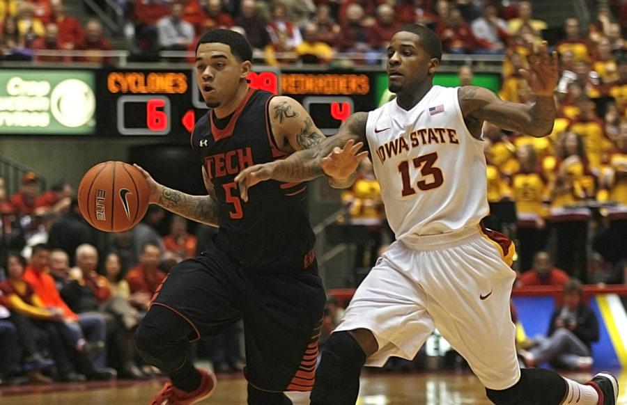 Iowa States Korie Lucious goes up against Texas Techs Josh Gray on Feb. 23 at Hilton Coliseum. The Cyclones defeated the Red Raiders 86 to 66. 
