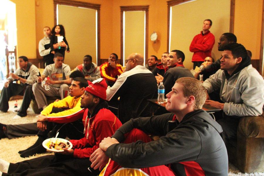 The ISU mens basketball team waits in anticipation during the 2013 NCAA tournament selection show at ISU coach Fred Hoibergs home on March 17, 2013. The Cyclones were announced as a No. 10 seed in the tournament. 
