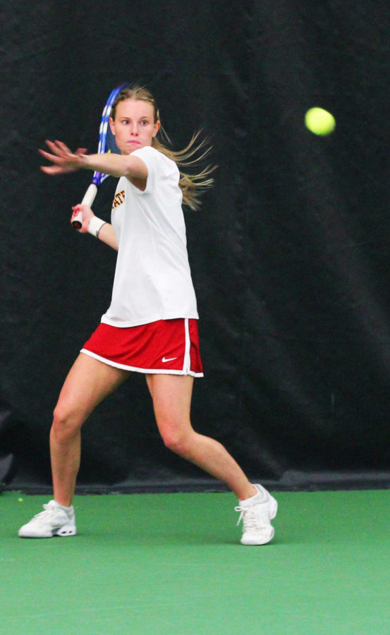 Sophomore+Caroline+Hauge+Andersen+prepares+to+return+the+ball+during+the+meet+against+Texas+Christian+University+on+Sunday%2C+March+17%2C+2013%2C+at+Ames+Racquet+%26amp%3B+Fitness.%0A