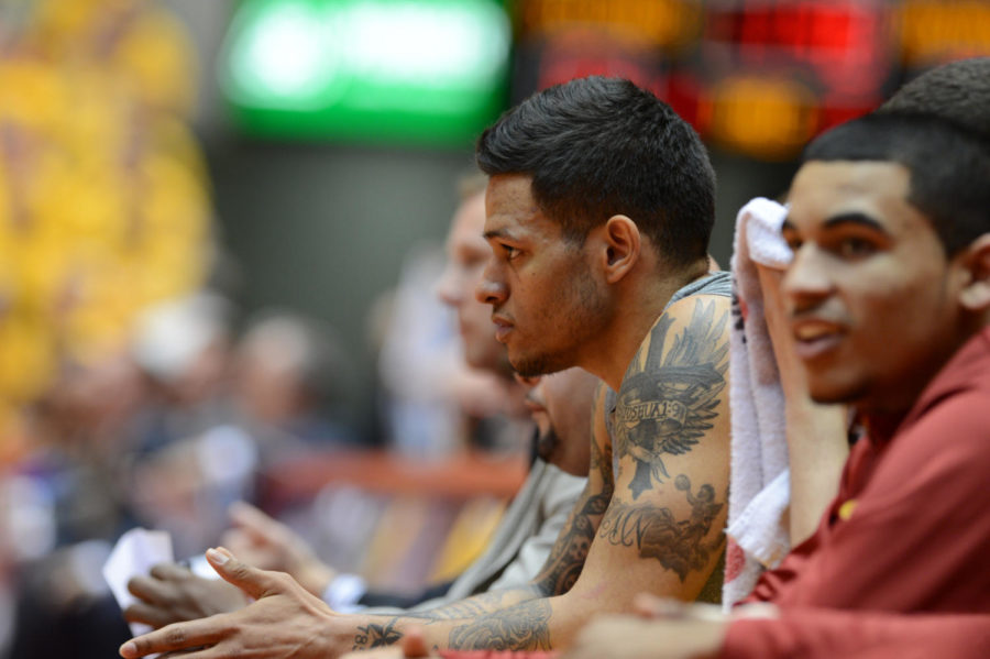 Chris Babb watches the game against Kansas on Feb. 25 at Hilton Coliseum. Cyclones lost 108-96. 
