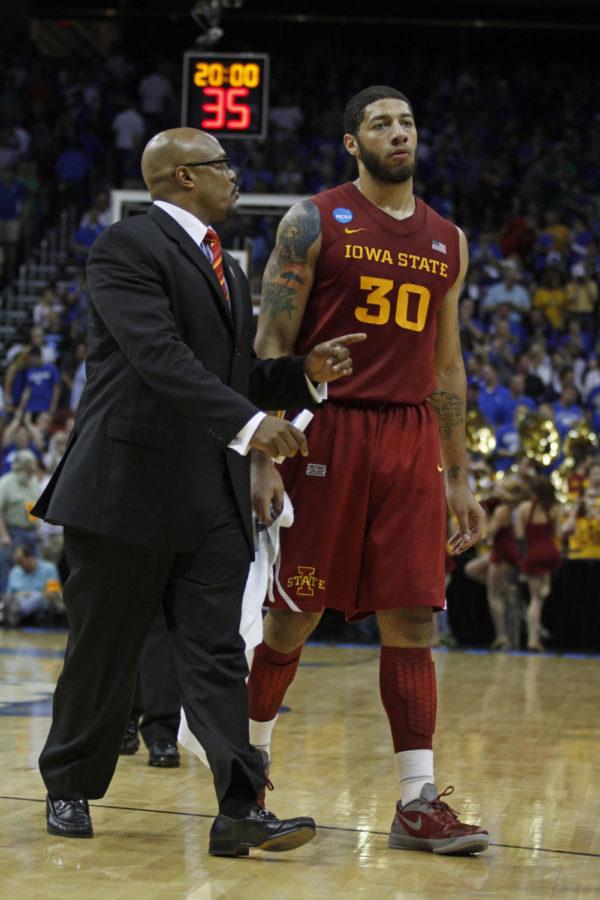 ISU assistant coach Cornell Mann walks off the court with forward Royce White at halftime of the Cyclones NCAA tournament matchup with Kentucky on Saturday night in Louisville, Ky. The Cyclones trailed 38-27 at halftime, would open the second half on a 15-4 run to tie the game at 42, but ultimately would fall 87-71 to the No. 1 Wildcats.

