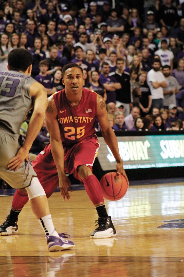 Senior Tyrus McGee holds the ball during the 79-70 loss against Kansas State on Feb. 9, at Bramlage Coliseum. 
