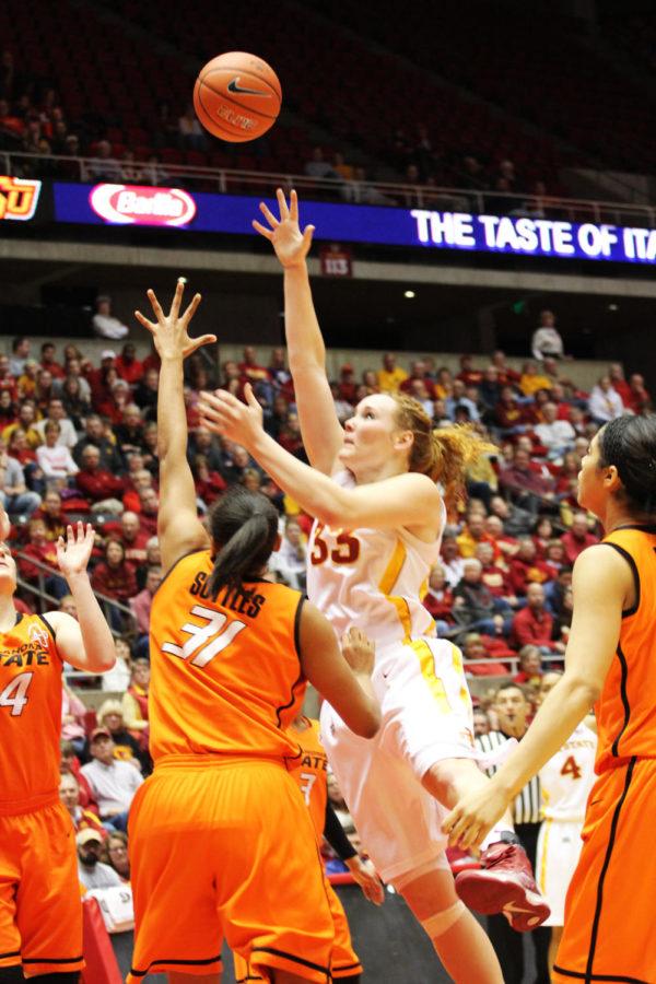 Senior Chelsea Poppens shoots against the Oklahoma State University Cowgirls on March 4.
