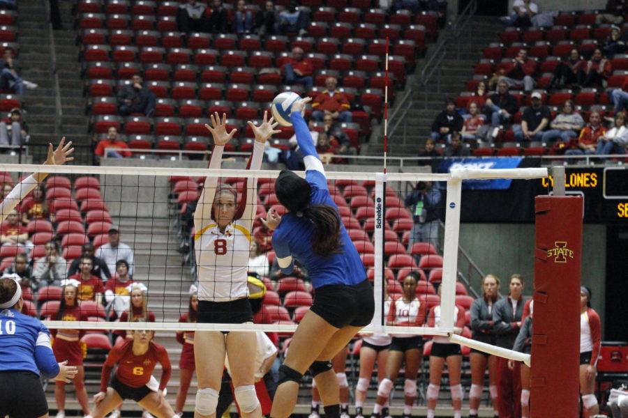 Iowa States Andie Malloy jumps to attempt to block an IPFW Mastodon player from sending the ball over the net in the first round of the NCAA Volleyball tournament Thursday, Nov. 29 at Hilton Coliseum.
