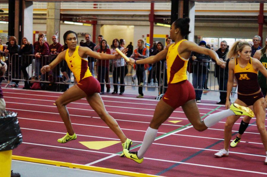Iowa States Ese Okoro hands off to Ejiro Okoro at the Iowa State Classic on Feb. 9 in Lied Recreation Center. The 4x400m team took first place with a time of 3:41.10.
