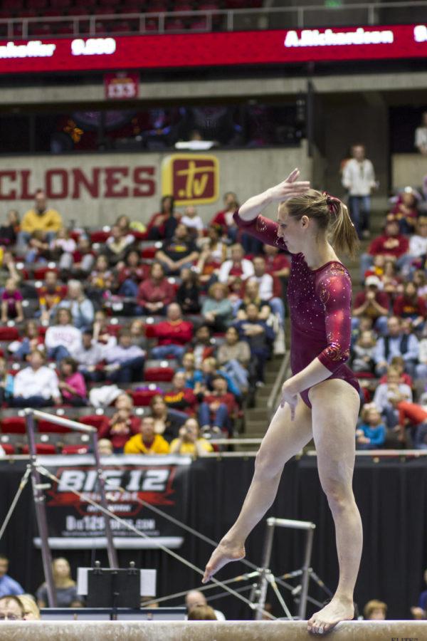 Elizabeth Stranahan balances on the beam, at which she scored a 9.700. Iowa State hosted the Big 12 Championship in gymnastics on Saturday, March 23, 2013, at Hilton Coliseum. The championship featured Iowa State, Oklahoma and West Virginia. Oklahoma took the championship with a score of 197.200. Iowa State scored 196.175 and West Virginia scored 194.675.
