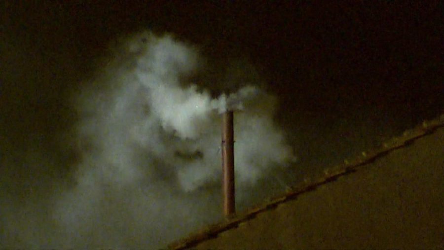 White smoke pours out of the chimney signifying that a new Pope has been chosen.

