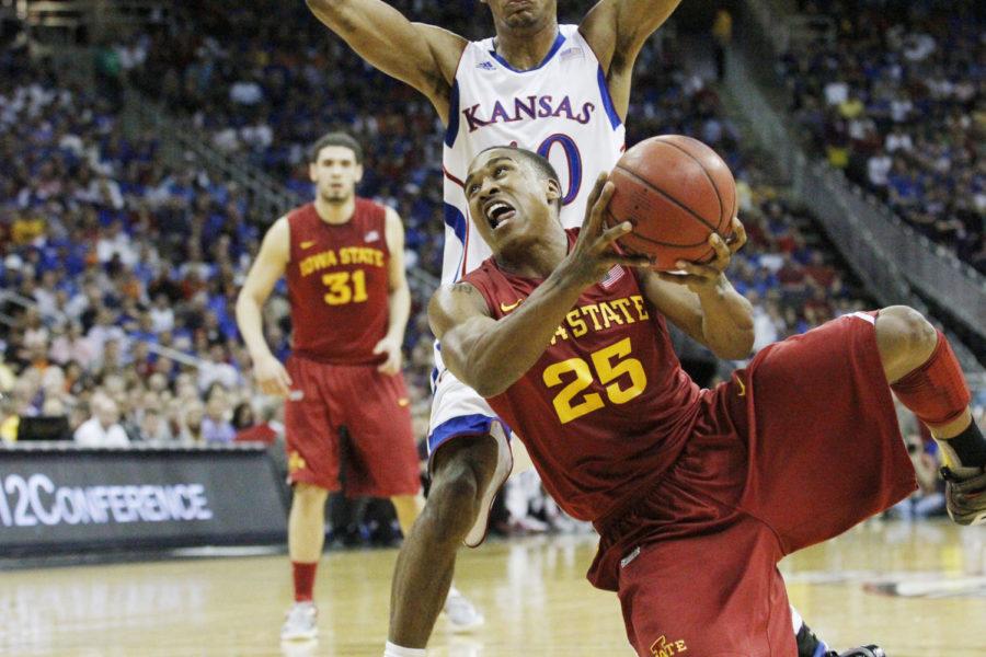 ISU+senior+Tyrus+McGee+attempts+to+go+for+a+basket+against+Kansas+in+the+Big+12+semifinals+at+the+Sprint+Center+on+March+15%2C+2013.+%C2%A0McGee+went+4-of-10+in+the+88-73+loss.%0A