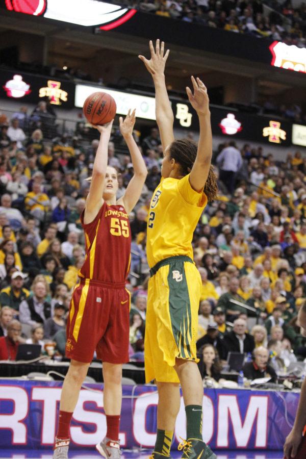 ISU center Anna Prins launches a three-pointer while Baylor post Brittney Griner attempts to block the shot in the game on March 11, 2013. Prins had a total of 20 points in the game.
