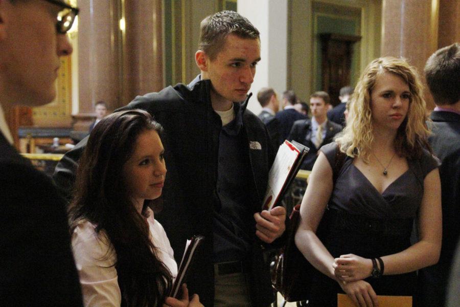 Junior Claire Yetley, junior Zach Murrel and senior Elizabeth Bertelson listen to Sen. Steve Sodders on March 13, 2013 at the Capitol Building.  Both the Senate and House of Representatives were in bill hearings so the regents had to wait outside to talk to individual politicians outside.
