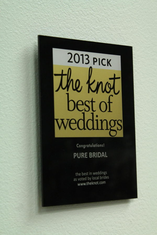 
The 2013 Best of Weddings Award from The Knot was given to Pure Bridal, a store native to Ames. Owners and sisters Kayse Carter and Rita Gartin help their brides enjoy a great experience when finding the perfect gown.

