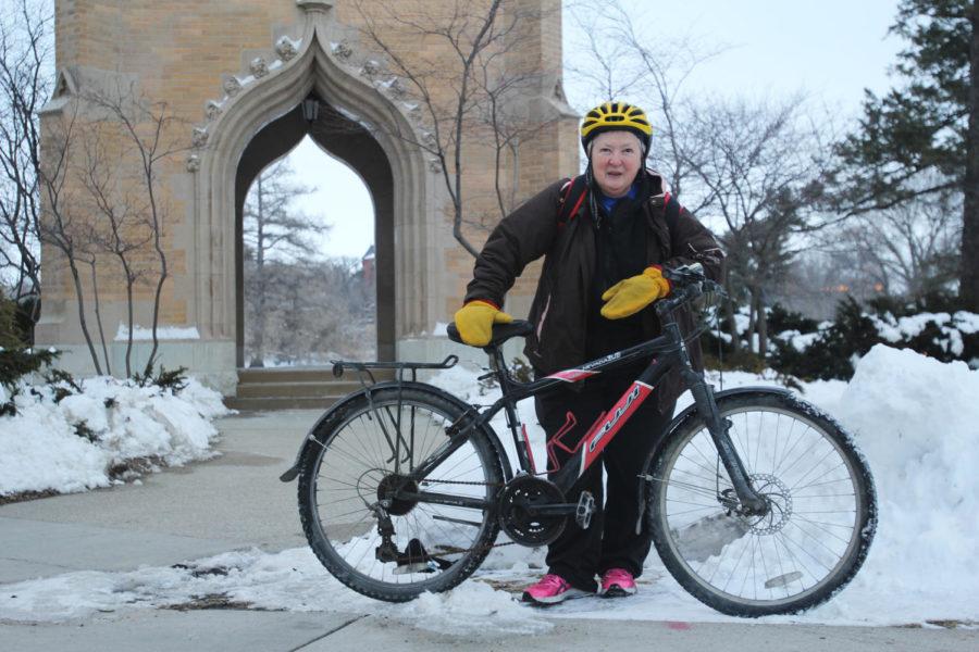 Joyce Bricker rides her bike across campus on March 1. She is planning a cross-country trip from California to Florida.
