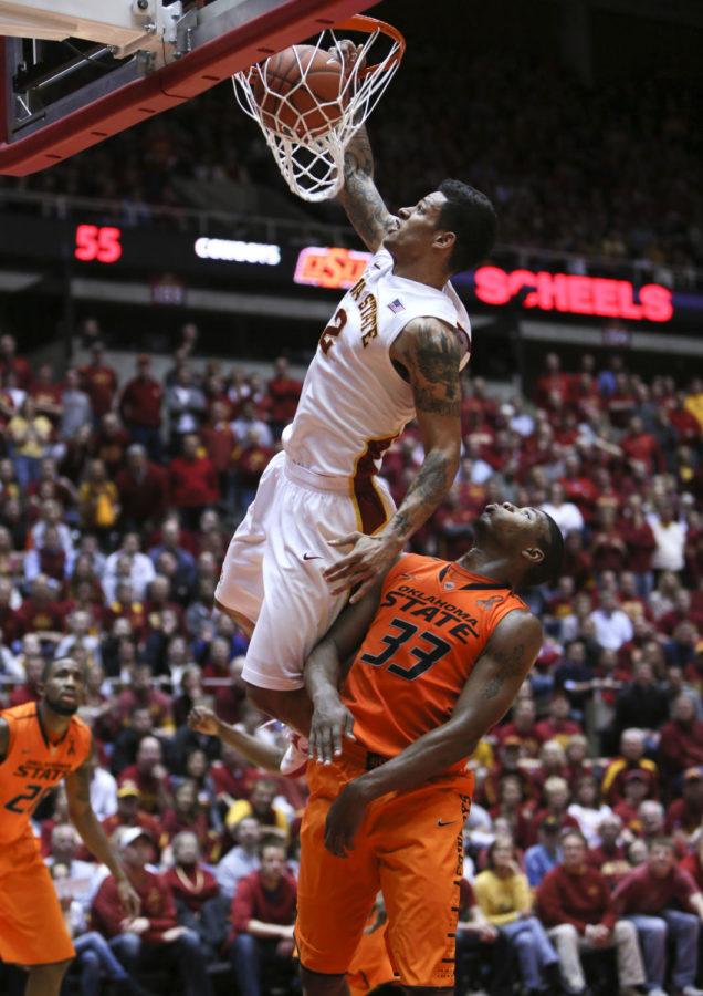 Iowa States Chris Babb dunks over Oklahoma States Marcus Smart. The Cyclones beat the Cowboys 87-76.
