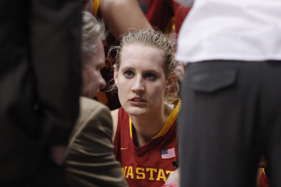 Anna Prins listens to head coach Bill Fennelly during a break in the game against the Baylor Lady Bears at the American Airlines Center on March 11, 2013.
