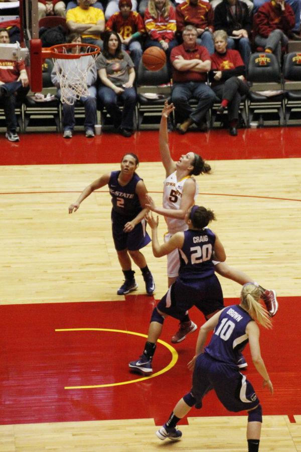 Junior forward Hallie Christofferson goes up for the shot against Kansas State on Feb. 9 at Hilton Coliseum.  Christofferson led the team in total points and scored a career-high with 25 in the 87-71 win.
