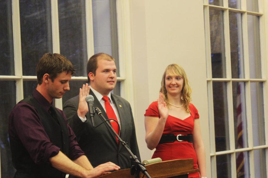 Spencer Hughes, junior in speech communication, and Hillary Kletscher, junior in biological systems engineering, are sworn in as president and vice president of GSB on April 8, 2013 in the Campanile Room of the Memorial Union.
