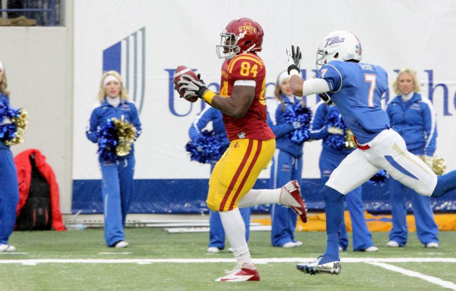Ernst Brun, Jr. runs the ball to score a touchdown for the Cyclones during the first quarter of the AutoZone Liberty Bowl game between the Cyclones and Tulsa Golden Hurricane at the Liberty Bowl Memorial Stadium in Memphis, Tenn. on Dec. 31. The Cyclones fell to Tulsa with a final score of 31-17.

