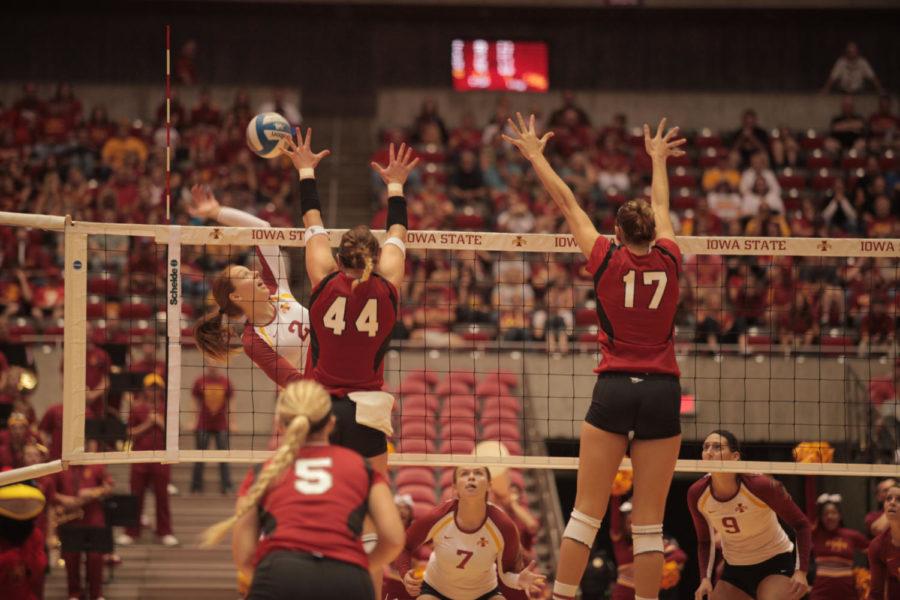 Freshman Mackenzie Bigbee attempts to hit the ball during the game against Nebraska on Saturday, Sept. 15, at Hilton Coliseum. Cyclones won 3-1, which is the first time Cyclone volleyball team has defeated a No. 1 team in school history. 
