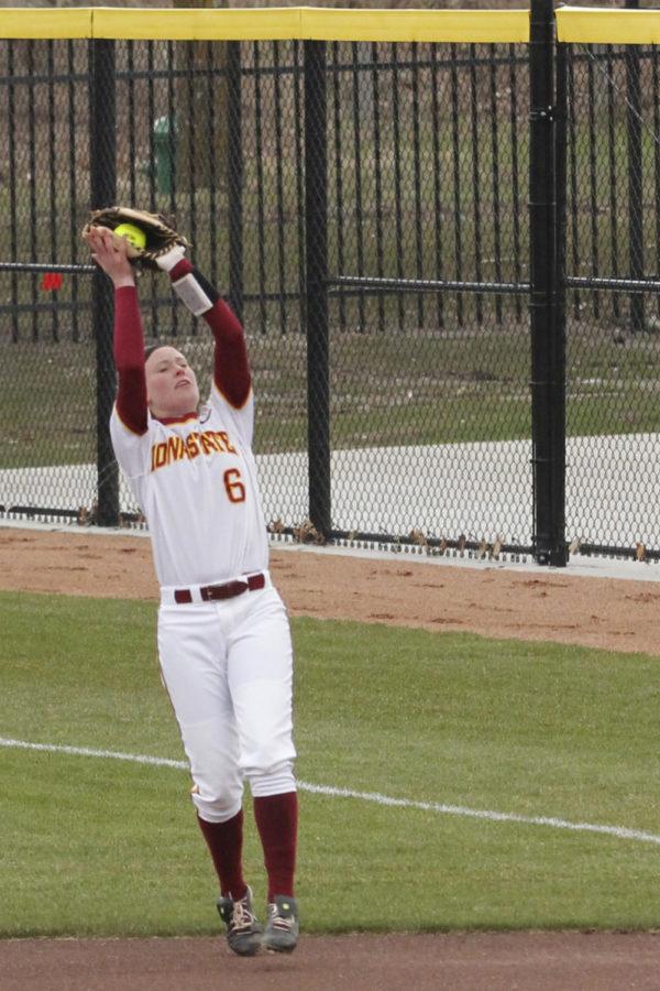 Junior second baseman Sara Davison catches the ball in the game against Texas Tech on April 19, 2013, at the Cyclone Sports Complex.  Davison recorded six putouts in the 6-5 victory.
