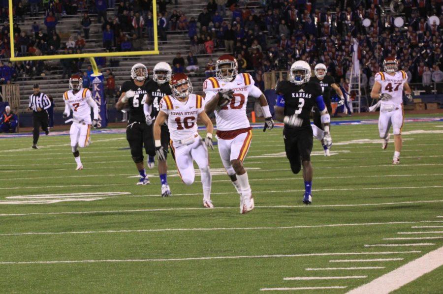 Junior defensive back Jacques Washington rushes down the field after intercepting a Jayhawk two-point conversion on Nov. 17 at Memorial Stadium in Lawrence, Kan. The Cyclones defeated Kansas 51-23 and became bowl eligible.
