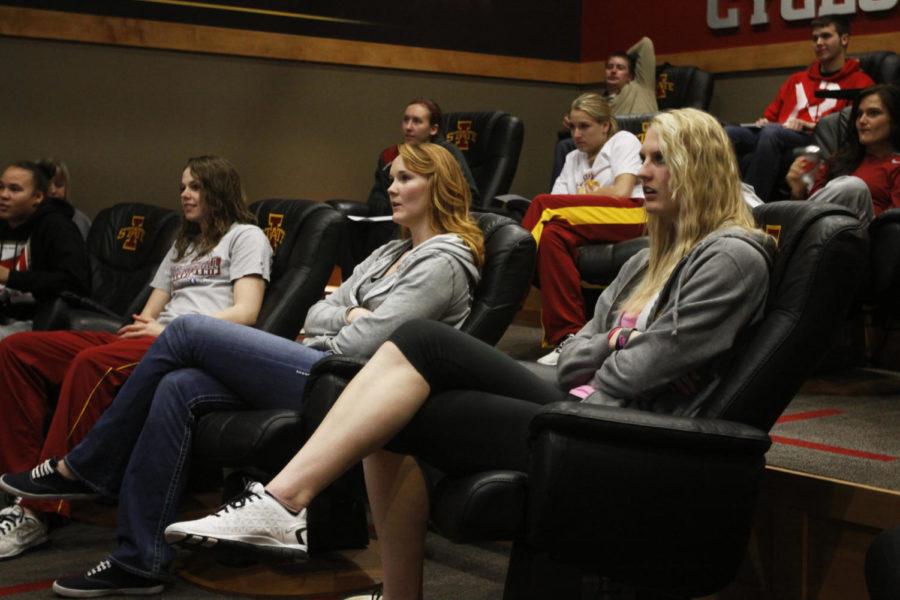 Seniors Chelsea Poppens and Anna Prins watch the 2013 WNBA Draft with the rest of the ISU womens basketball team on April 15, 2013, at the Sukup Basketball Complex in Ames.
