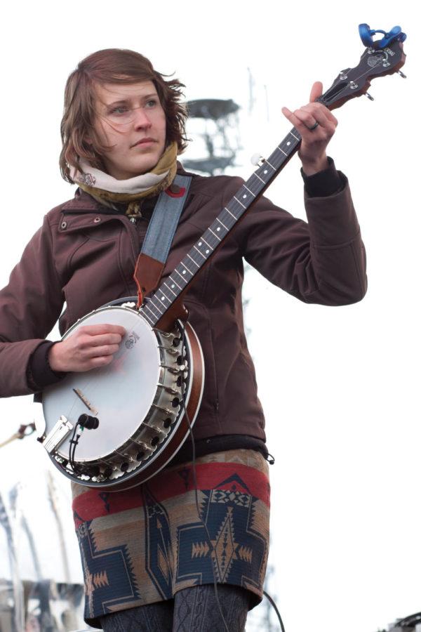 Jacquelyn Beaupre of Blessed Feathers plays her banjo during the Wisconsin bands Live @ Veishea set Sat., April 20, 2013, at the Molecular Biology parking lot.

