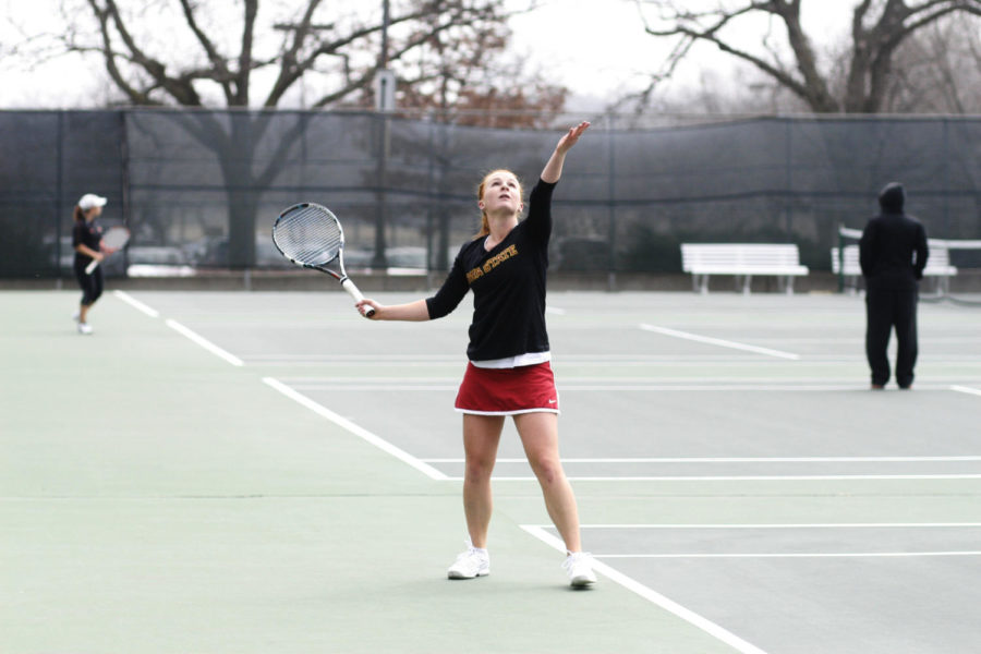 Sophomore Meghan Cassens serves the ball in a match against Oklahoma State on Sunday, April 7, 2013, at Forker Tennis Courts. Iowa State lost 6-1.
