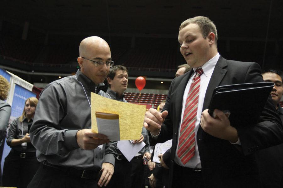 Joel Brewer, senior in business management, interviews with Steven Abolatia from Union Pacific Railroad during the Business, LAS and Human Sciences Career Fair Wednesday, Sept. 28, 2011 at Hilton Coliseum.

