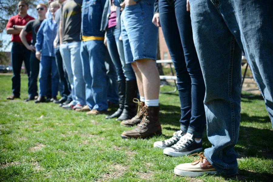 NROTC protests for Denim Day on Wednesday, April 24, 2013, by wearing blue pants. Demin Day is an event in which people are encouraged to wear jeans in order to raise awareness of rape and sexual assault.
