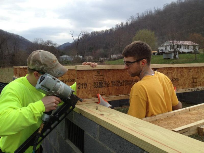 
Association of General Contractors members work on reconstruction in Tennessee during last Thanksgiving Break. Thirty-eight AGC members traveled south to put their construction backgrounds to work in the restoration of devastated homes from an August storm.


