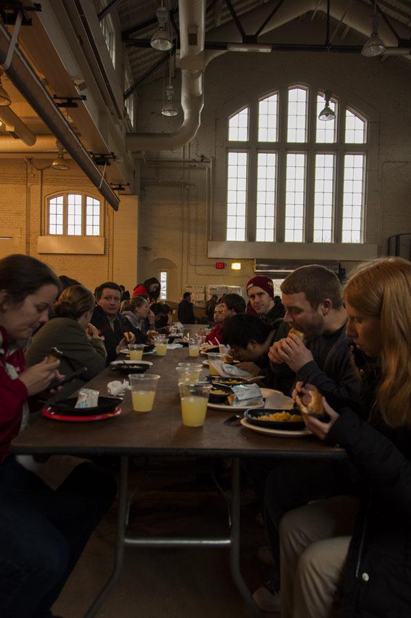 Students eat lunch in Kildee Hall after it was moved from Central Campus because of thunderstorms throughout the day on April 17, 2013. 
