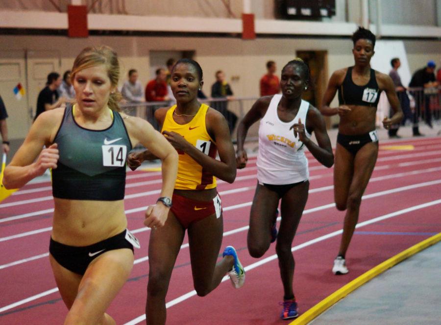 Betsy Saina, senior in child, adult and family services, runs in 5,000-meter at the Iowa State Classic in Lied Recreation Center on Feb. 9. Saina broke the previous record of 15:29 in the 5,000-meter run with a time of 15:21.66, finishing almost four seconds in front of the second-place runner.
