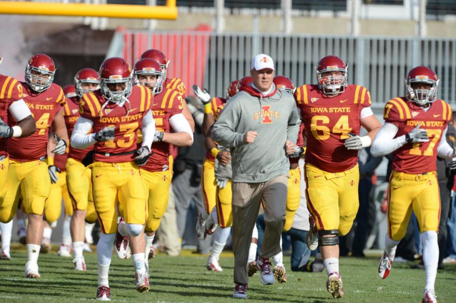 Coach Paul Rhoads leads his players running through the tunnel before the kickoff on Saturday, Nov. 3, 2012 at Jack Trice Stadium.
