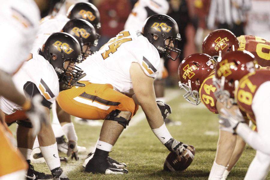 The OSU offense prepares to go up against the ISU defense during the game Friday, Nov. 18. Iowa State won in double overtime with a final score of 37-31, making them eligible for a bowl game.
