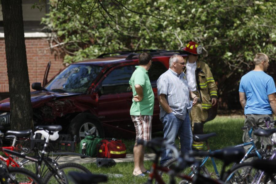 An SUV hit a moped parked on Stange and a tree outside of Lago Marcino Hall on Monday, May 20, 2013. The driver of the SUV suffered from a medical condition, which caused the crash.

