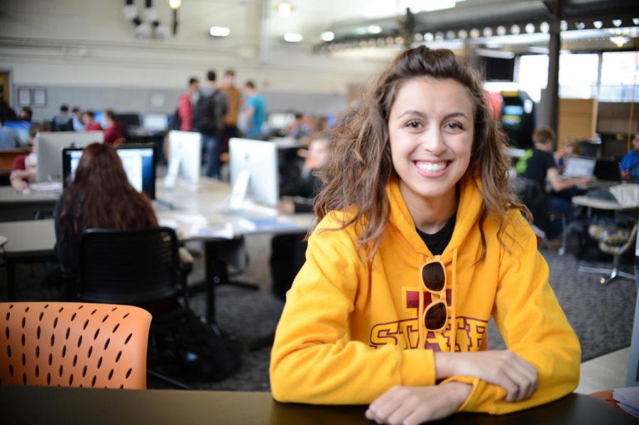 Cassidy Williams poses for the camera on Thursday, May 2, 2013, at a computer lab in Coover. Williams was elected as the president of the computer science club at Iowa State and will join 100 of the most forward thinkers in the United States on a British Airways flight.
