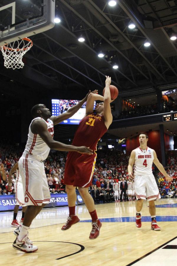 ISU freshman Georges Niang gets fouled by Ohio States Evan Ravenel in the third-round game of the NCAA tournament on March 24, 2013, at the University of Dayton Arena. Niang finished the game with eight points in the 75-78 loss.
