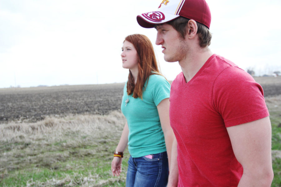 Katie Rutledge, president of Iowa States newest club the Conservation Club and freshman in agricultural business, agronomy and international agriculture, and Elliott Carlson, senior in mechanical engineering, walk along the Praeri Rail Trail on Friday, April 26, 2013.
